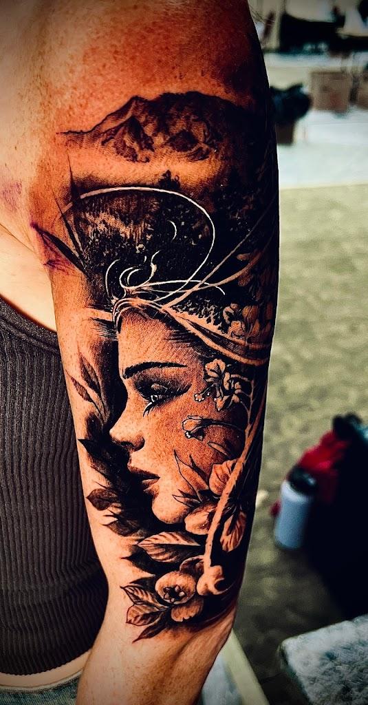 Off The Tracks Tattoo Shop By owner in Charlotte, North Carolina