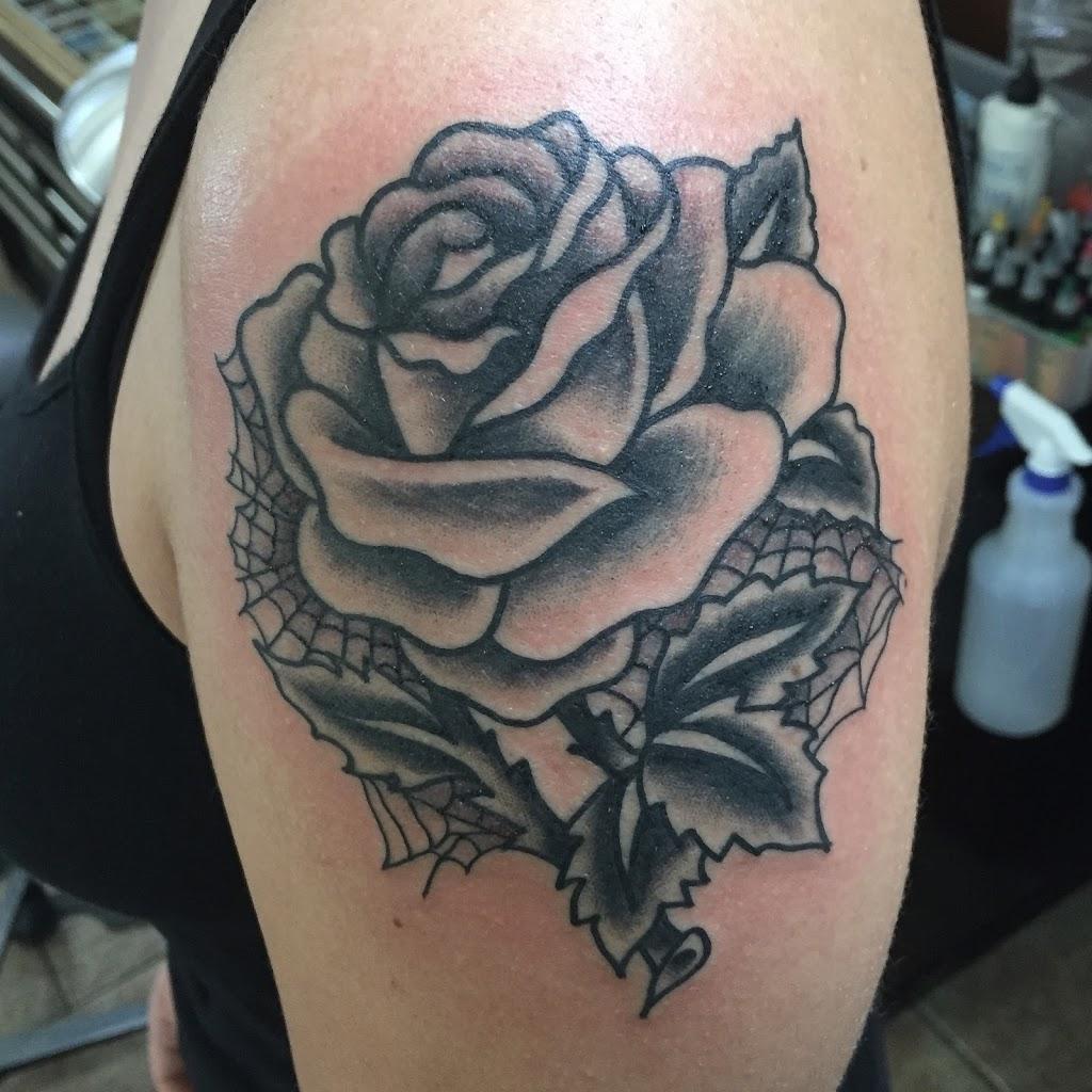 The Rusty Needle Tattoo