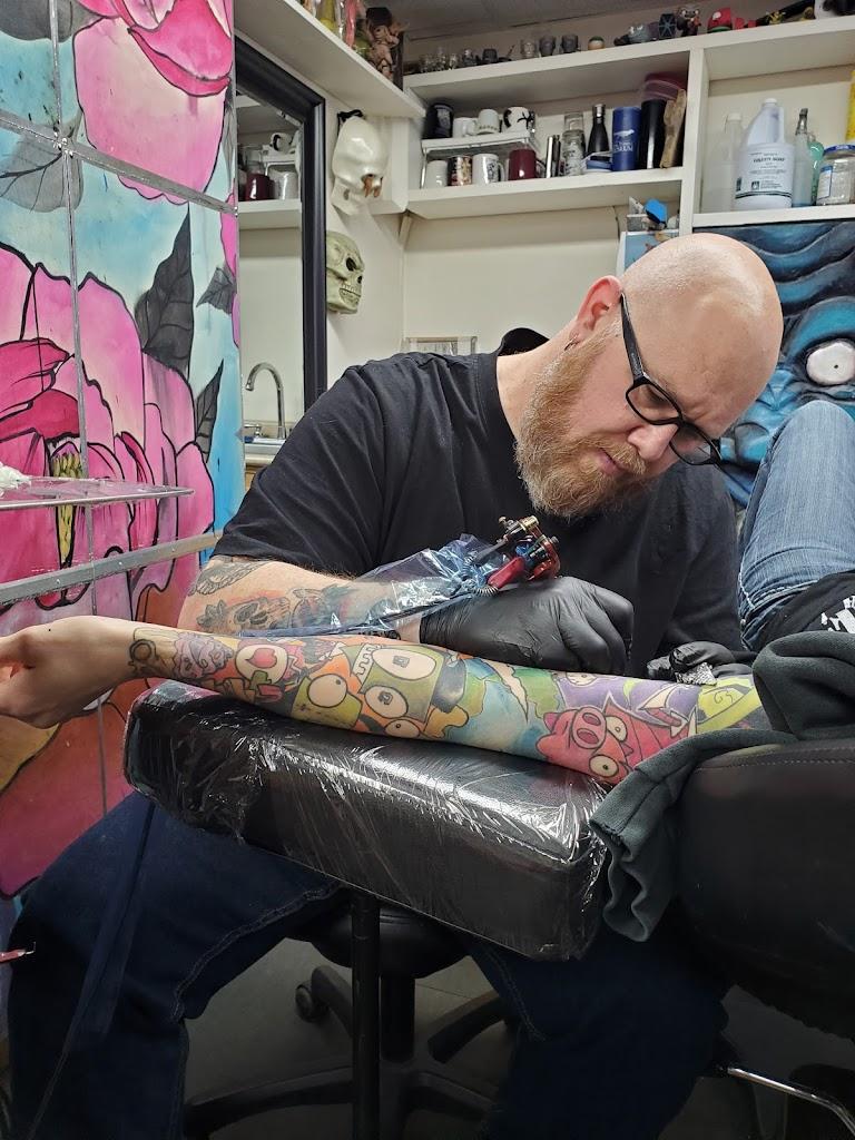 Molotov and Bricks Tattoo Tattoo in YT Y1A 2E7, Canada