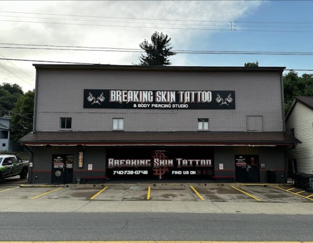 Breaking skin tattoo and body piercing