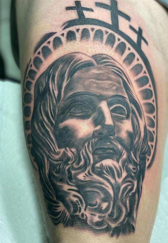Real Ink Tattoos & Piercings