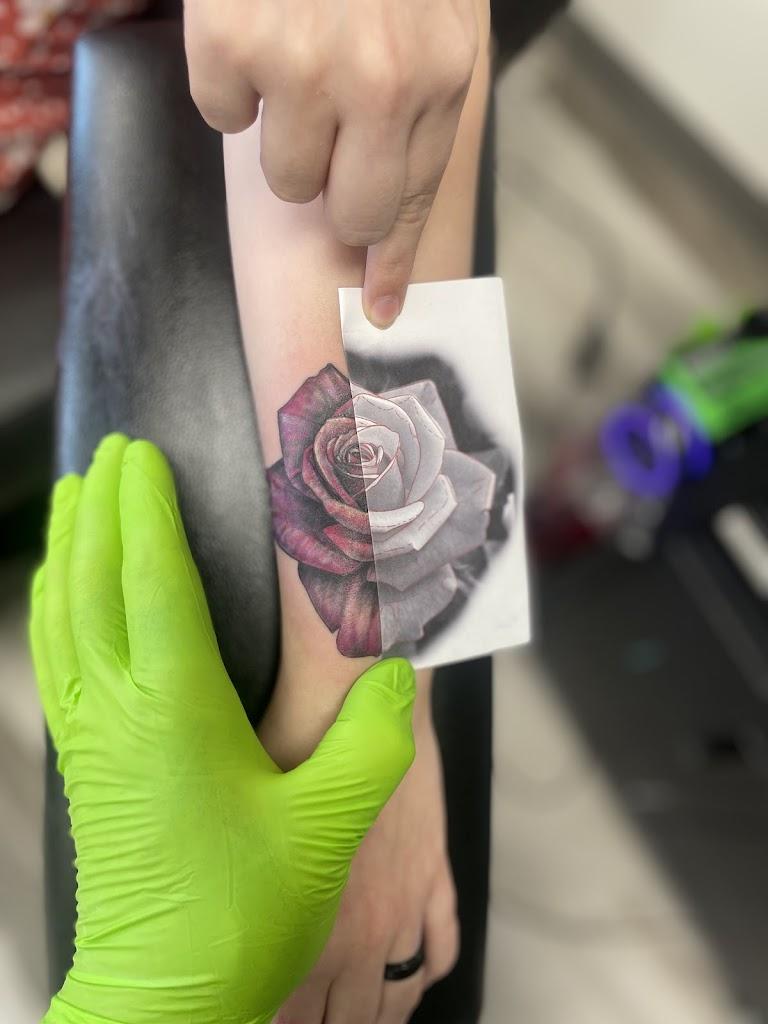 Alpha Tattoos & Piercings