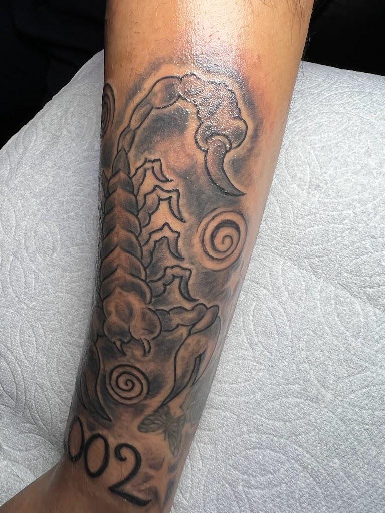 Blu Dragon Tattoo