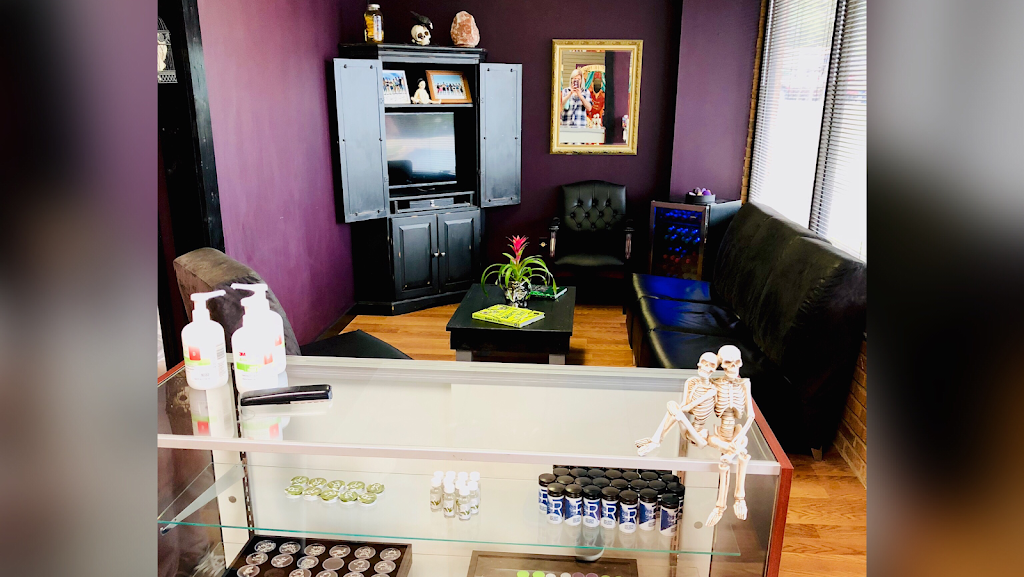 Cupid Slave Tattoo Company