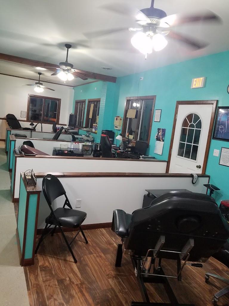 Pick Your Pleasure Tattoos & Piercings Inside in Thomson, Illinois