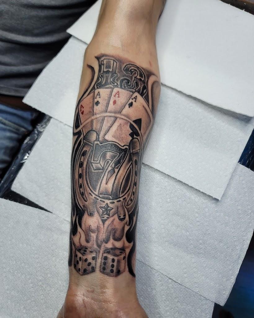 The Sailor's Den Tattoos and Piercing & The Scurvy Pearl Music Venue