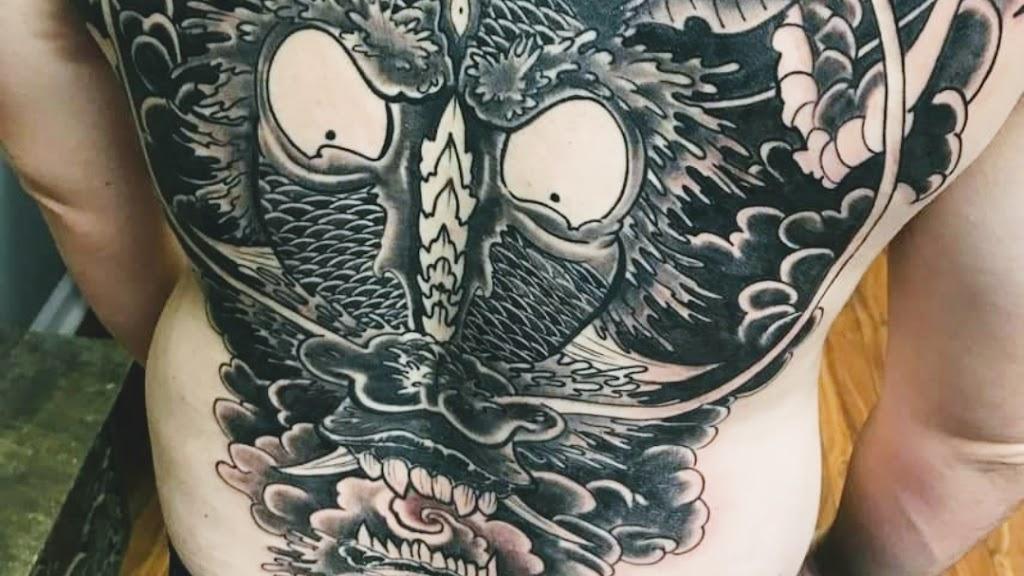 Black Ink Tattoo and Body Piercing