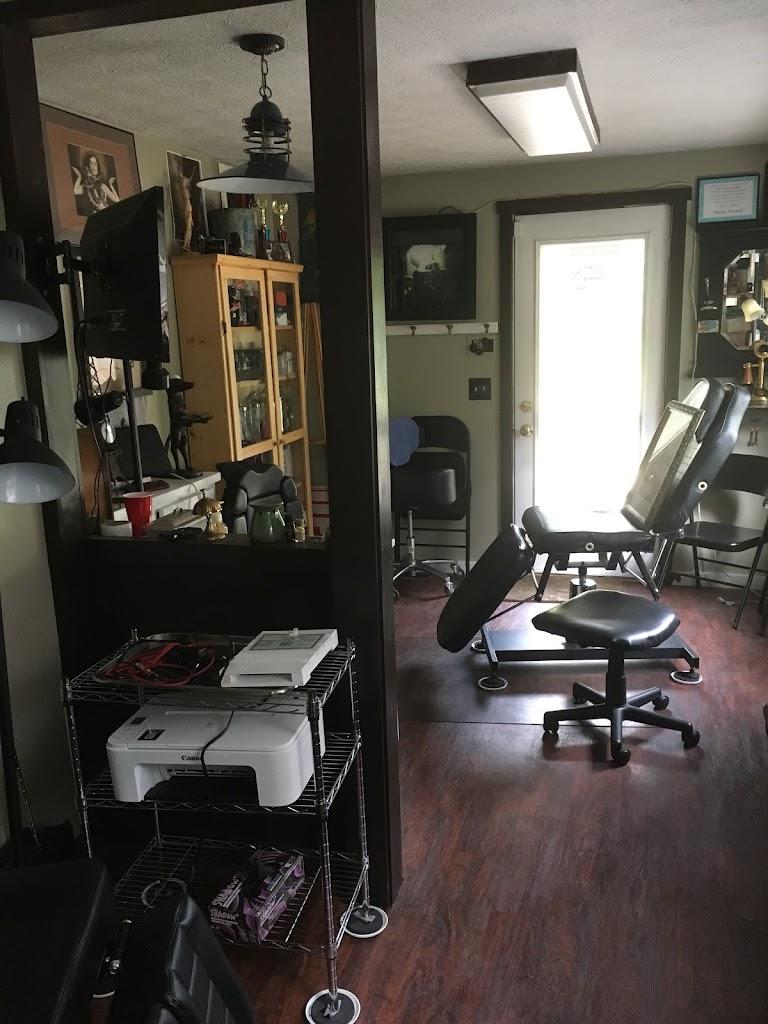 Utopian tattoo and body piercing Inside in Lyman, Maine