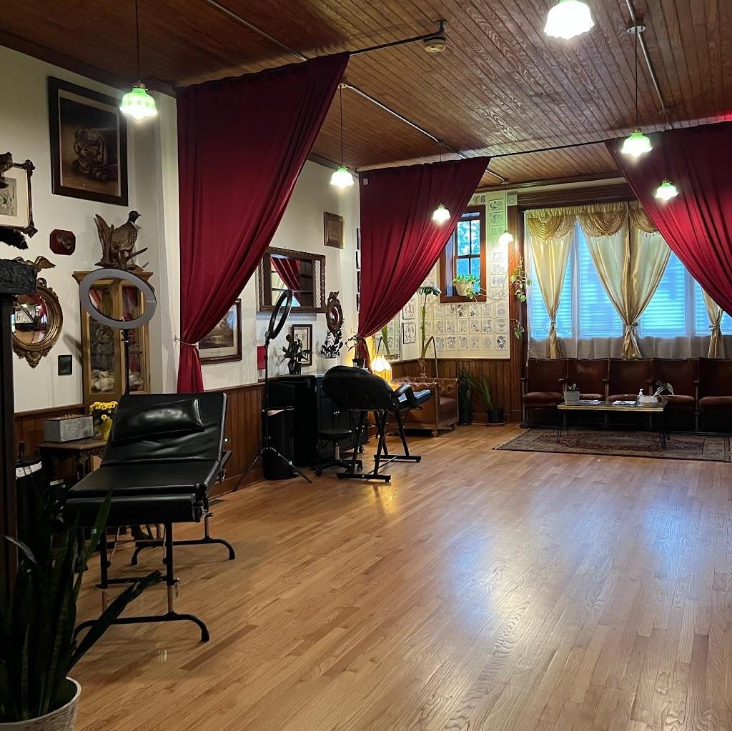 Hand of Fate Tattoo Inside in Meriden, Connecticut