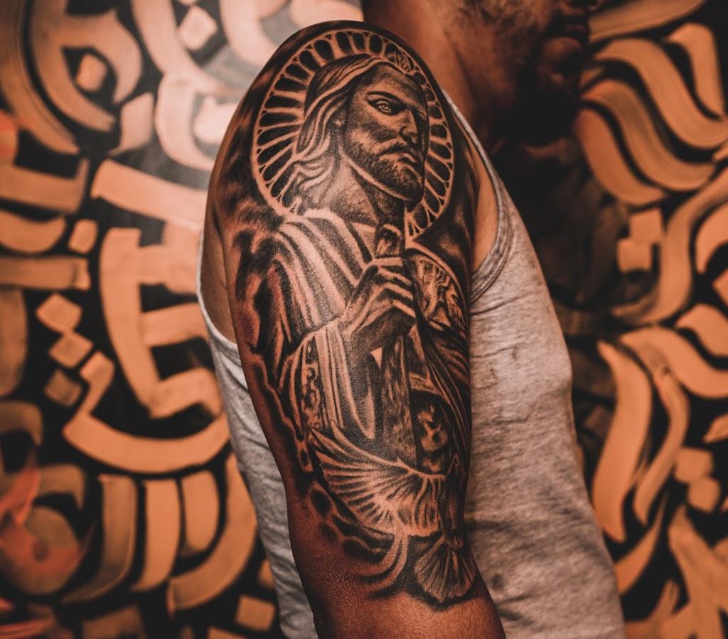 INK REVOLUZION TATTOOS LLC