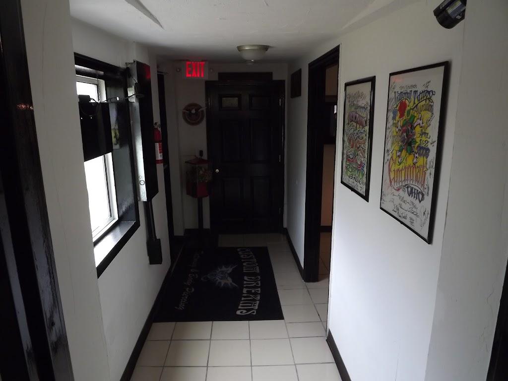 Custom Dreams Tattooing and Body Piercing Inside in Princeton, West Virginia