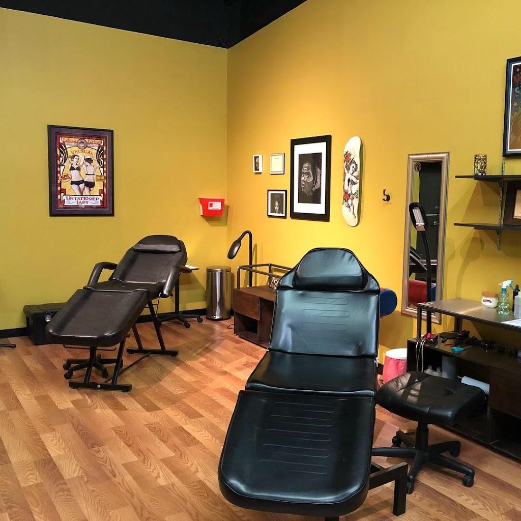 Cupid Slave Tattoo Company Inside in Covington, Georgia