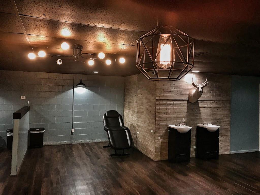 The Great Wilderness Tattoo and Body Piercing Inside in Warrior, Alabama