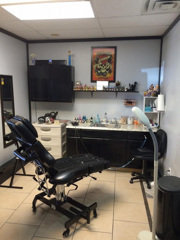 Renegade's Top Hat Tattoos Inside in Tulsa, Oklahoma