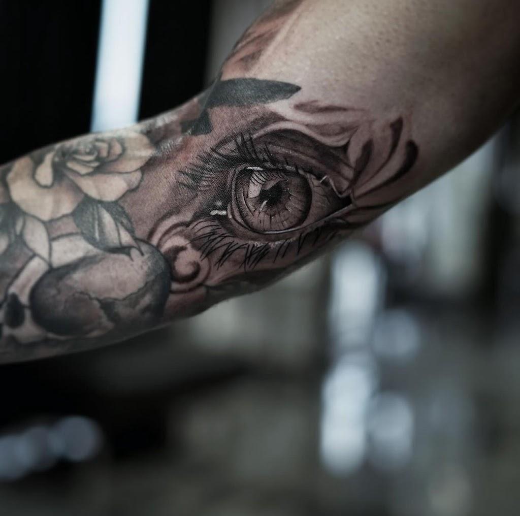 Sacred Raven Tattoo Shop