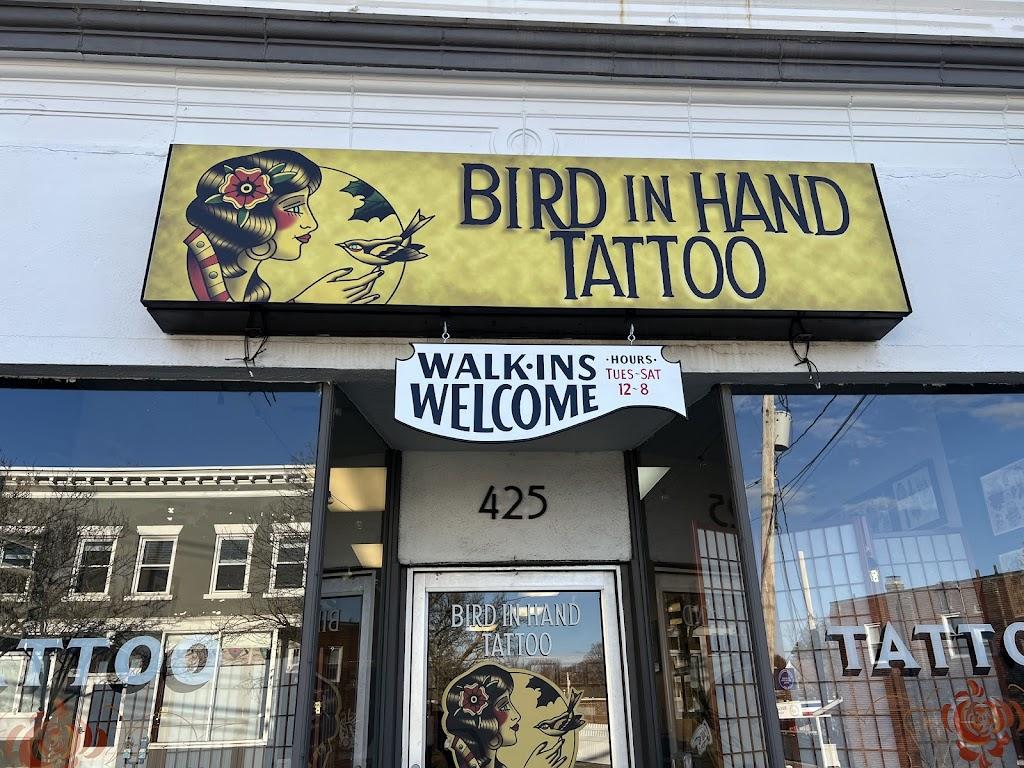 Bird In Hand Tattoo
