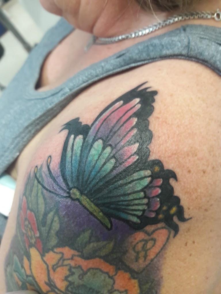 Earth & Moon Tattoos Tattoo in Tampa, Florida