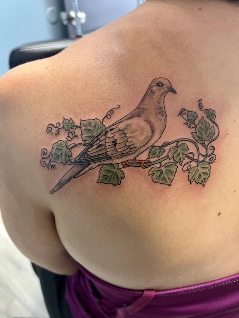 Etched in Ink Tattoo