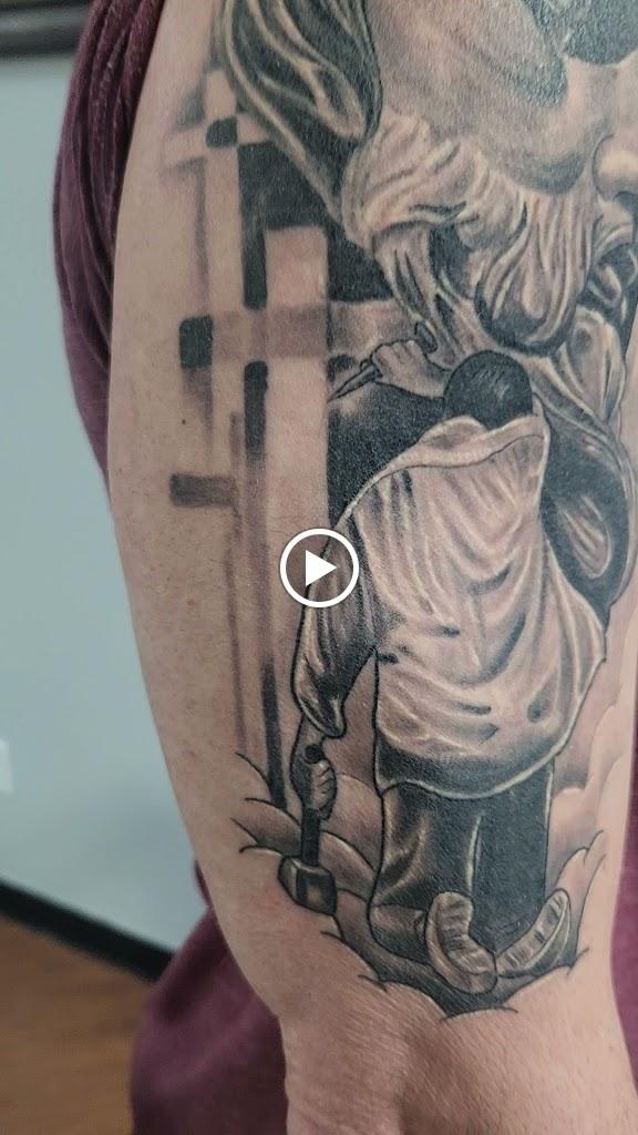Saved by Grace Tattoo Studio Videos in Rogers, Arkansas
