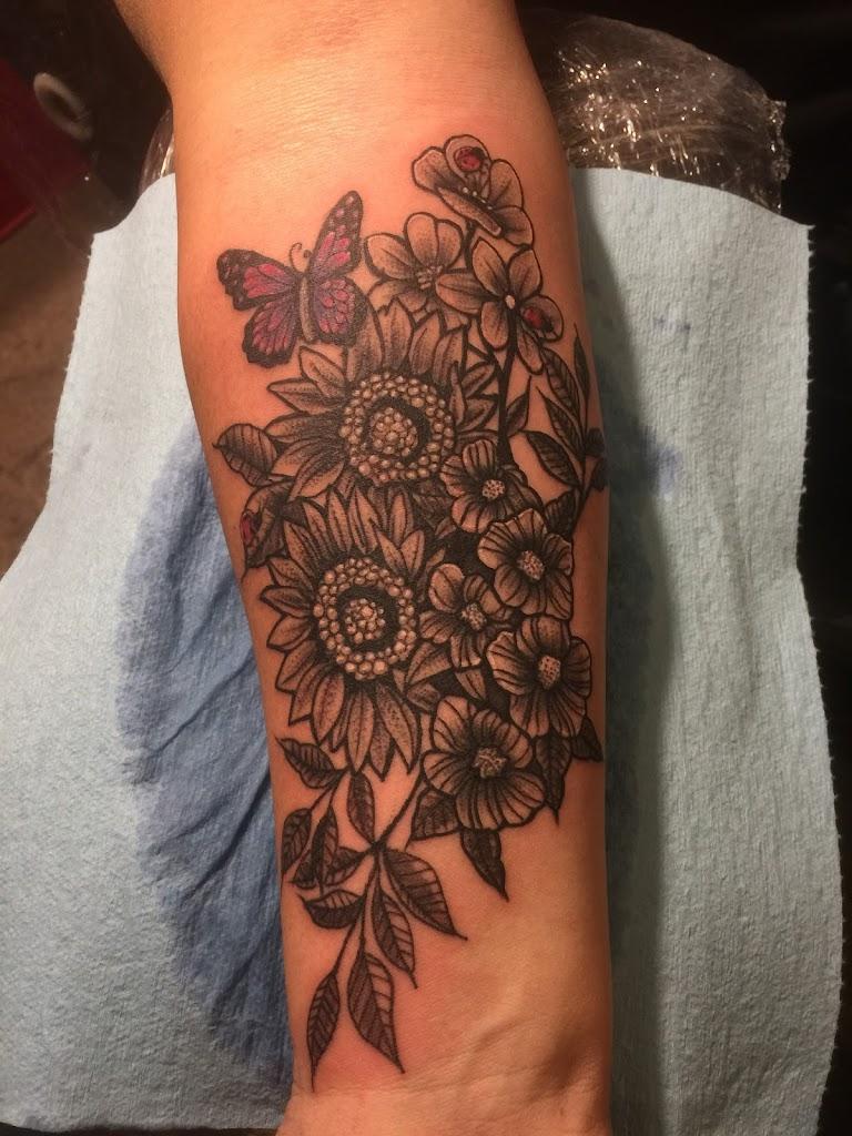 Walls of Wonder Tattoo And Body Piercing