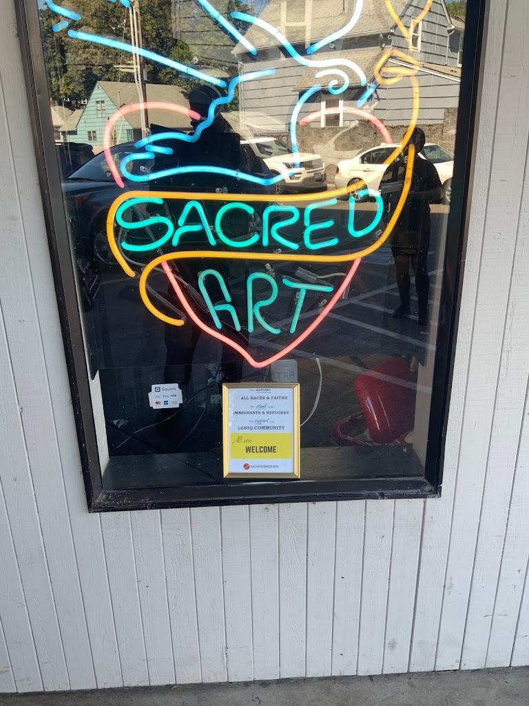 Sacred Art Tattoo